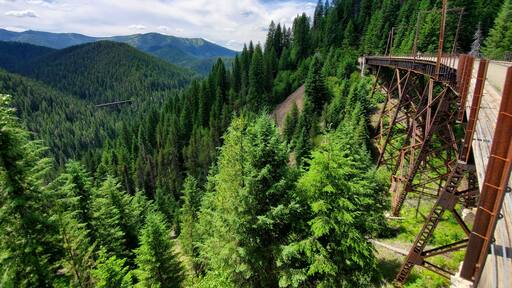 Slight downhill grade allows for a relaxing time taking in the incredible views on what used to be a rail-line. Many places to stop and read about the history.