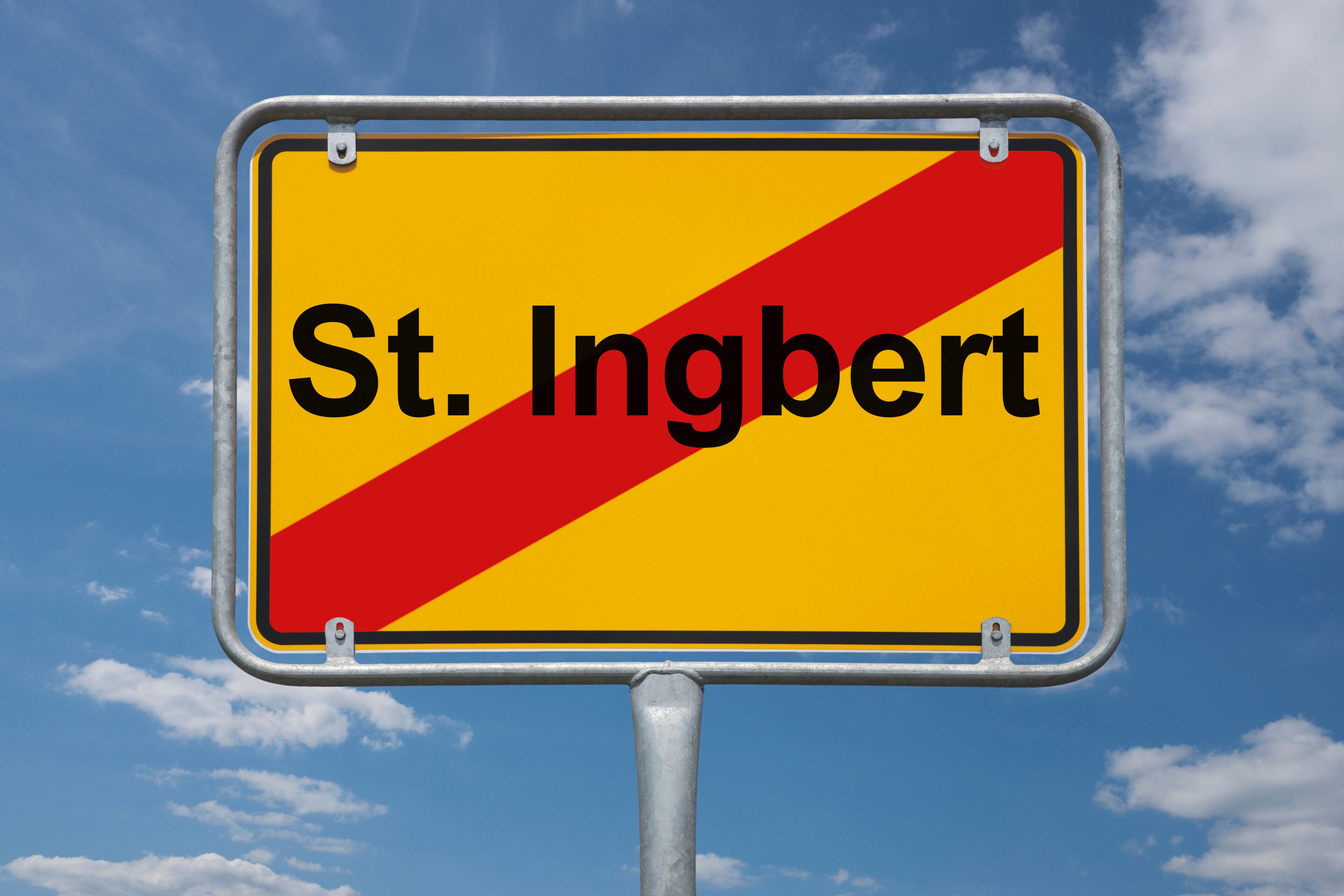 A road sign with the text "St. Ingbert" against a blue sky with clouds.