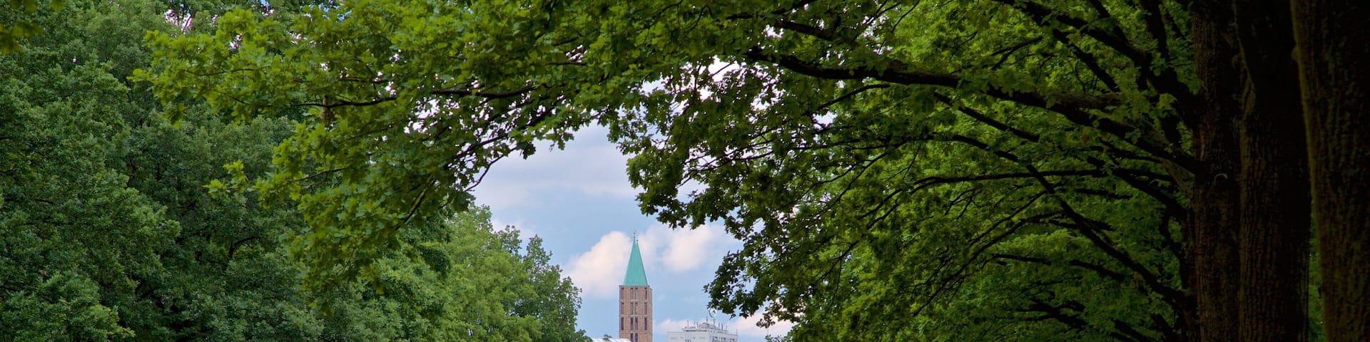 Karlsaue Park showing a river or creek, heritage architecture and a park