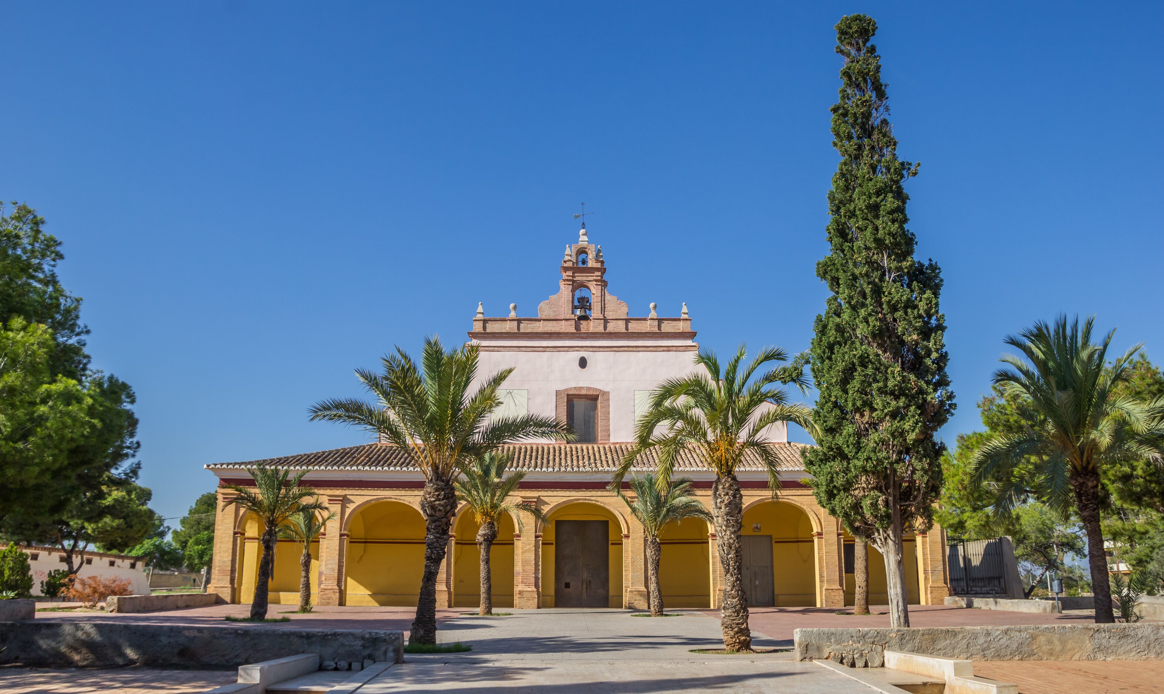 Park and old church in the center of Moncada, Spain