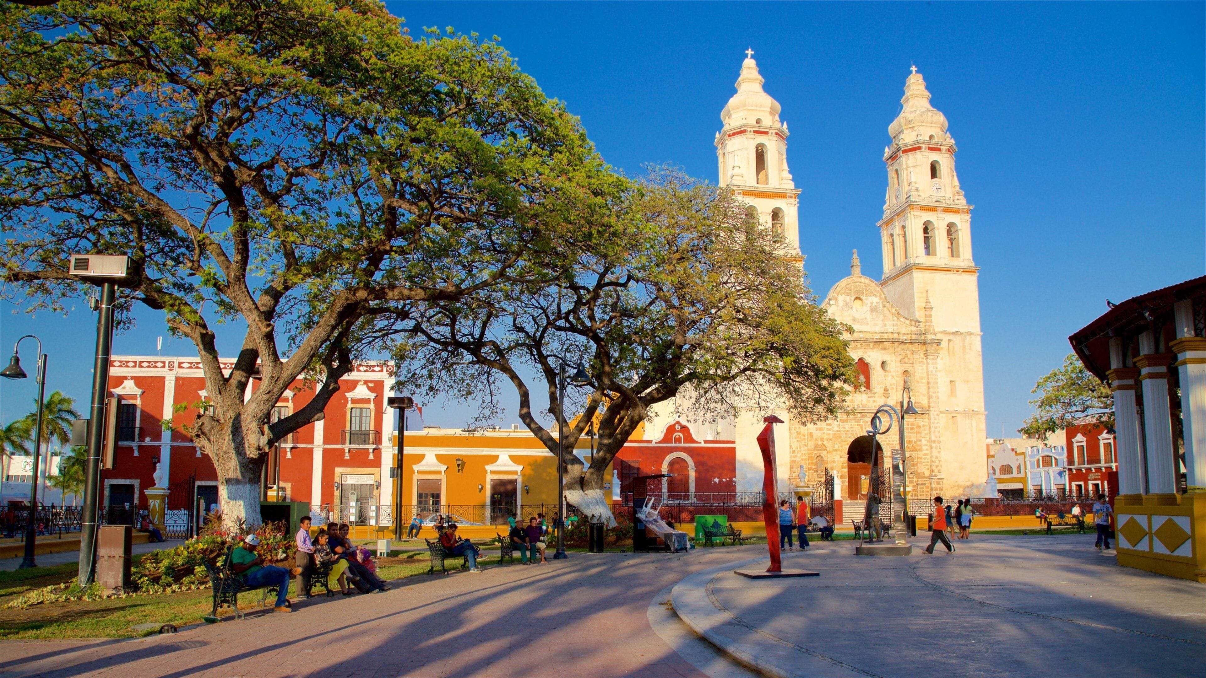 Campeche Cathedral featuring a sunset, a garden and heritage architecture