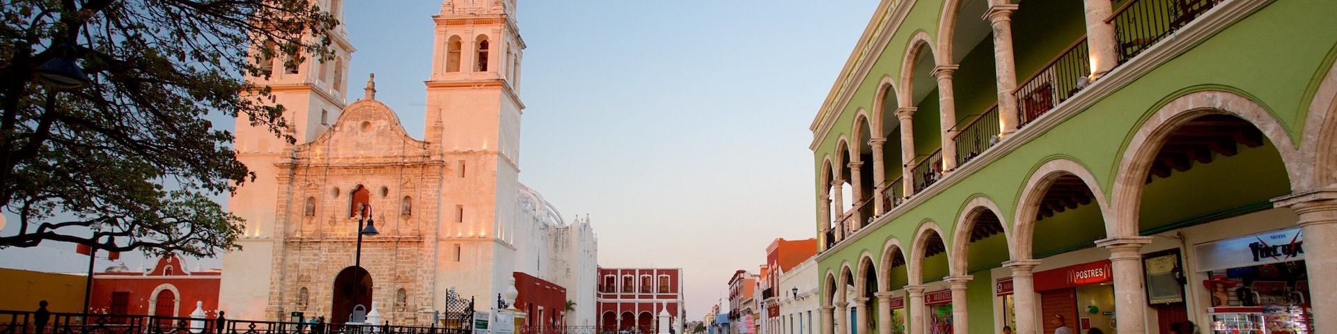 Campeche Cathedral which includes a sunset and heritage architecture