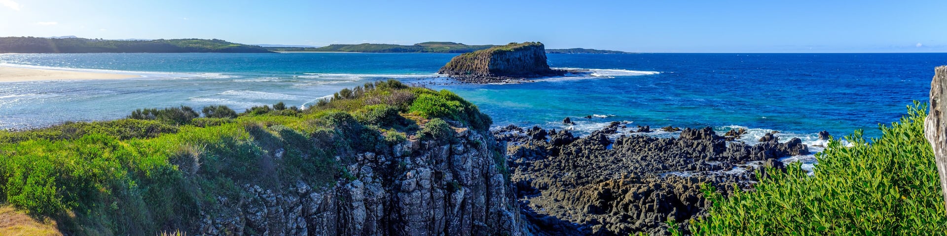 Australian landscape panorama view of the mouth of the Minnamurra river, out to Stack Island in the South Pacific Ocean, Minnamurra, New South Wales, Australia