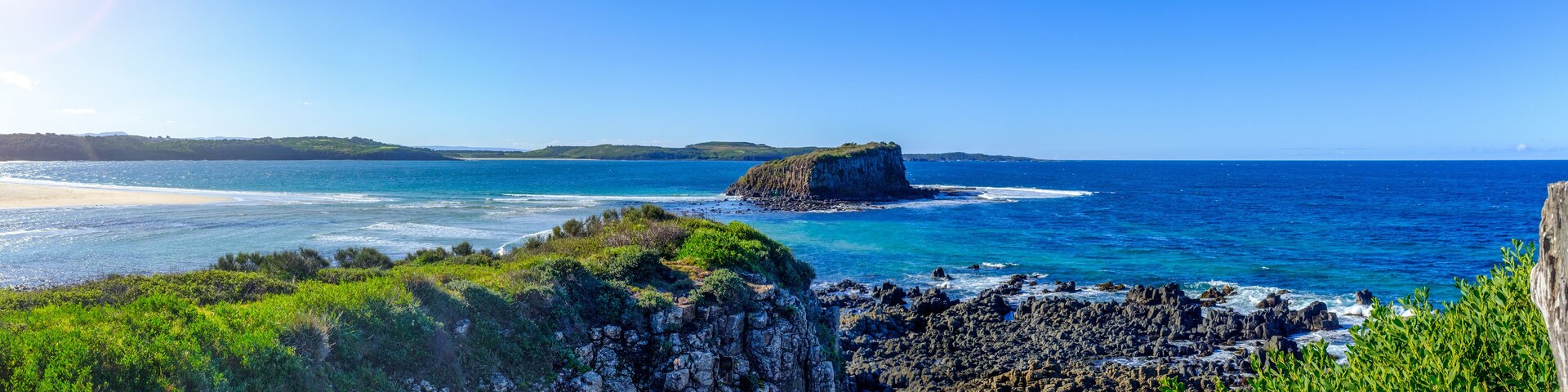 Australian landscape panorama view of the mouth of the Minnamurra river, out to Stack Island in the South Pacific Ocean, Minnamurra, New South Wales, Australia