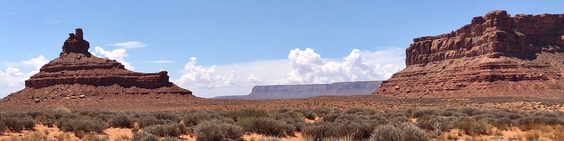 Battleship rock, located on the left, is one of the monoliths you can see along the 16 mile Valley of the Gods scenic byway.