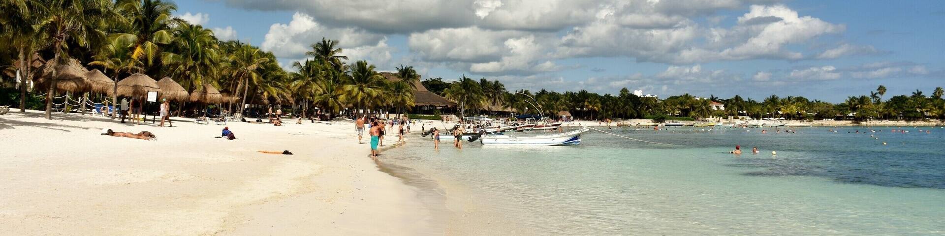 Akumal is a small town between Playa del Carmen and Tulum on the Yucatan Peninsula of Mexico. In the heart of the Riviera Maya just 37 km from Playa del Carmen and just one hour south of Cancun, Akumal is one of the best places to visit in the Mexican Caribbean for its great variety of beautiful beaches and tourist services.Akumal in the Mayan language means "Land of turtles" and it is still one of the favorite places for these marine animals to spawn. However, what makes Akumal charming and fascinating for tourists from around the world, is its spectacular bay with clear waters and underground rivers. Akumal is one of the most peaceful places in the Riviera Maya: one protected shallow bay with a secluded beach and a nearby reef