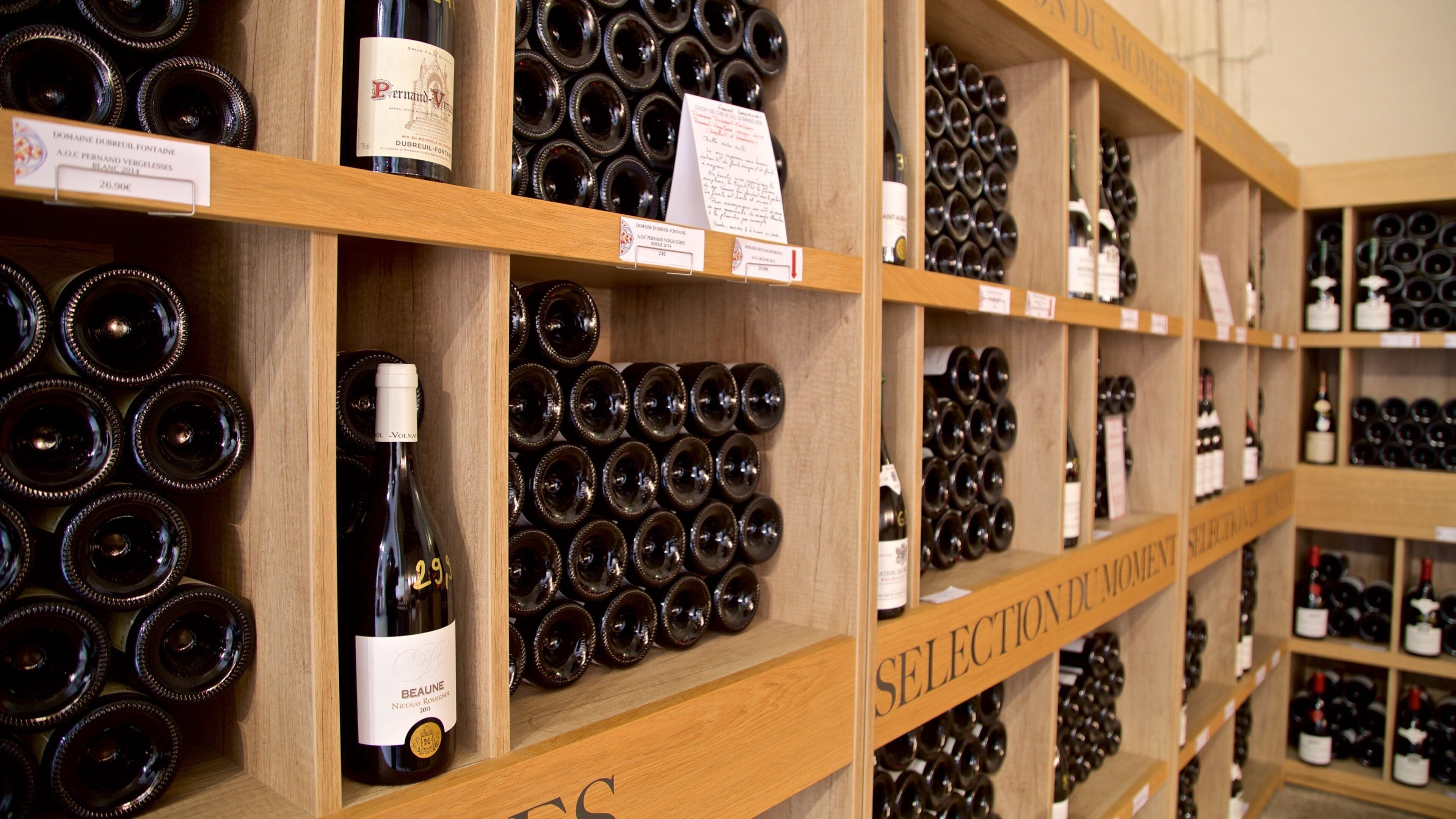 Marche Aux Vins Winery showing interior views and drinks or beverages