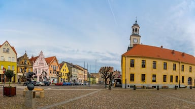 Panoramic view old market square with Town hall building in city Trzebiatow, Poland