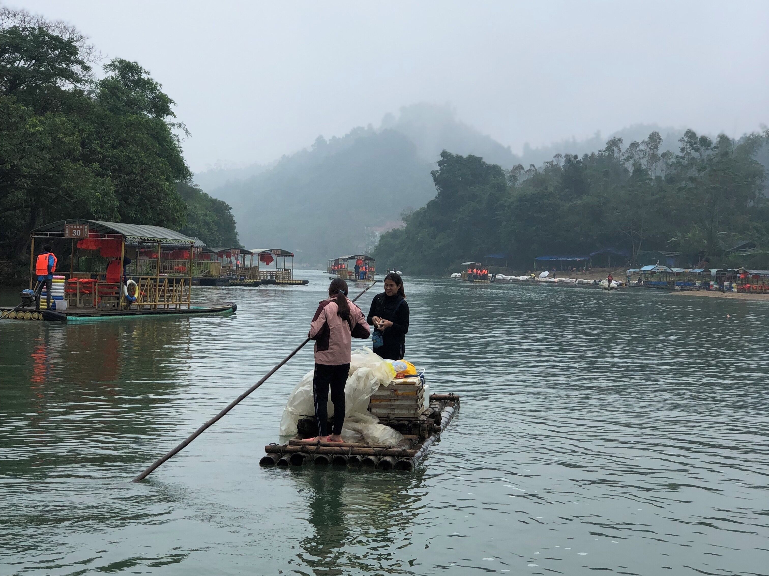 Vendor selling stuffs on row boat