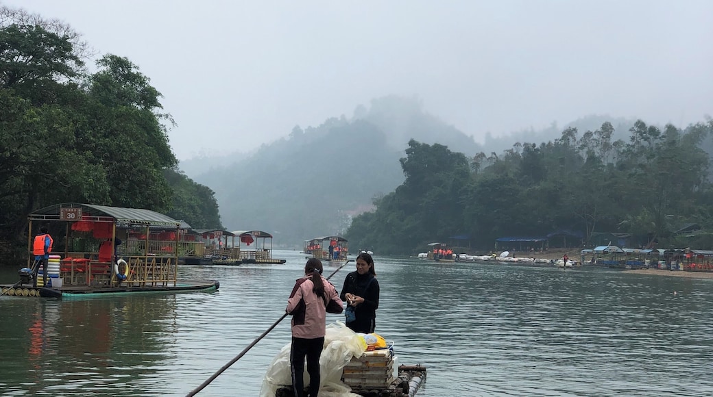 Vendor selling stuffs on row boat