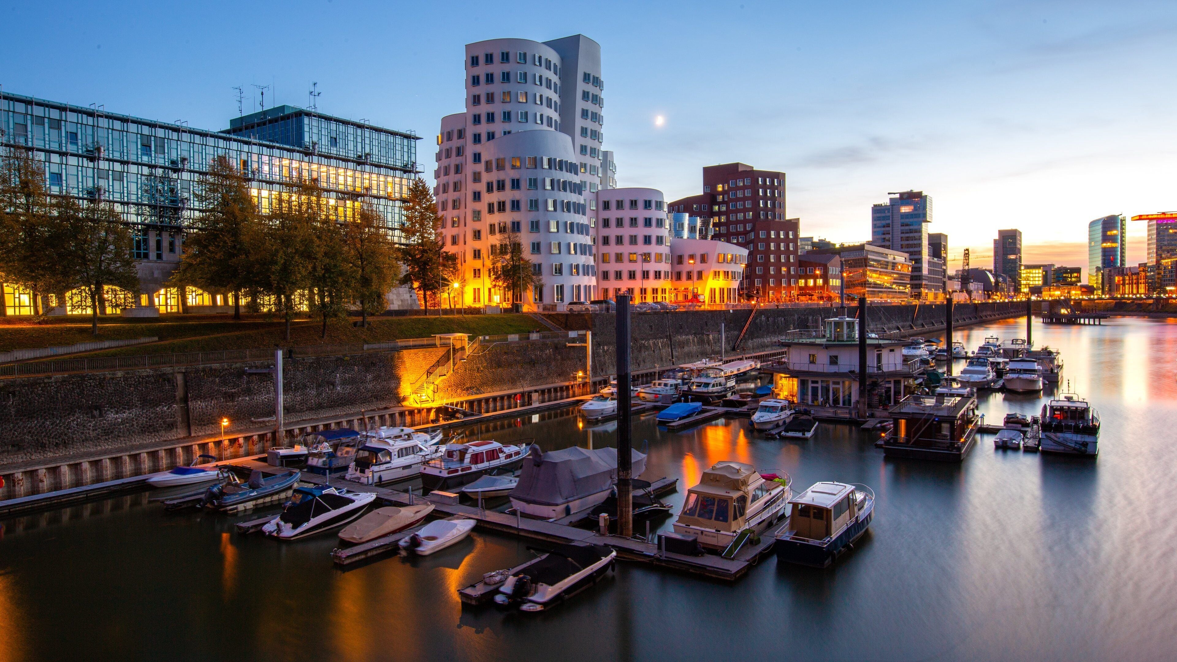 Duesseldorf-Hafen which includes night scenes, a bay or harbor and a sunset
