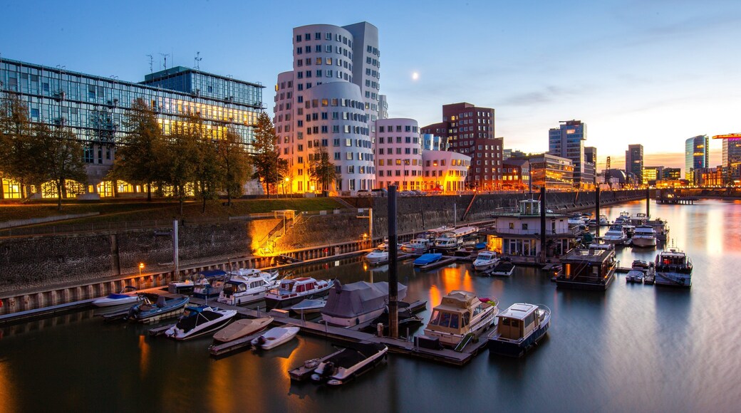 Duesseldorf-Hafen which includes night scenes, a bay or harbor and a sunset