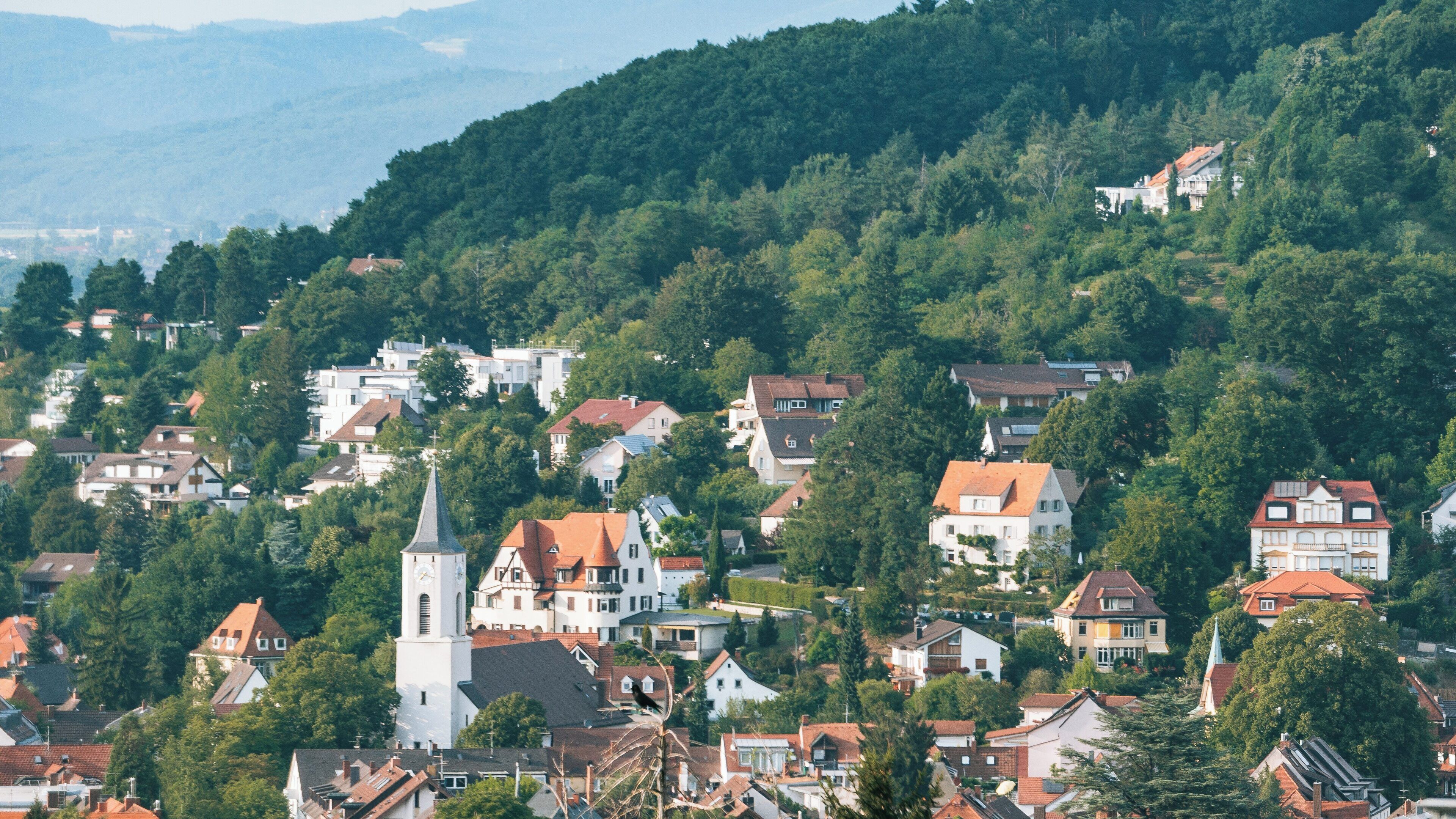 Historic charm and natural beauty blend in Freiburg im Breisgau, showcasing Schlossberg and peaceful residential areas