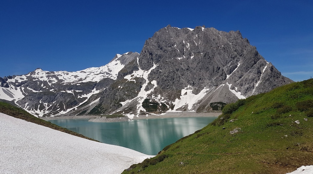 Mountains, snow and grass at the Lünersee, Austria!