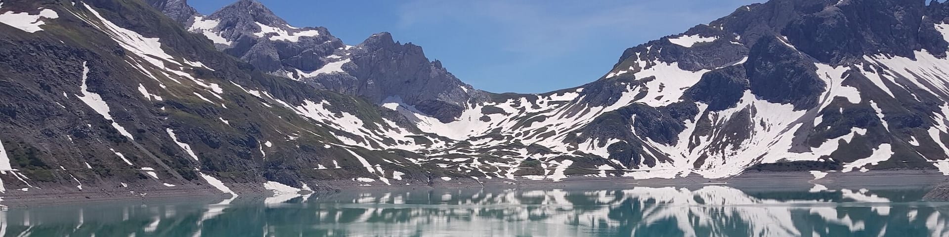 Beautiful reflection of the mountains in the Lünersee at 1973 meters high!