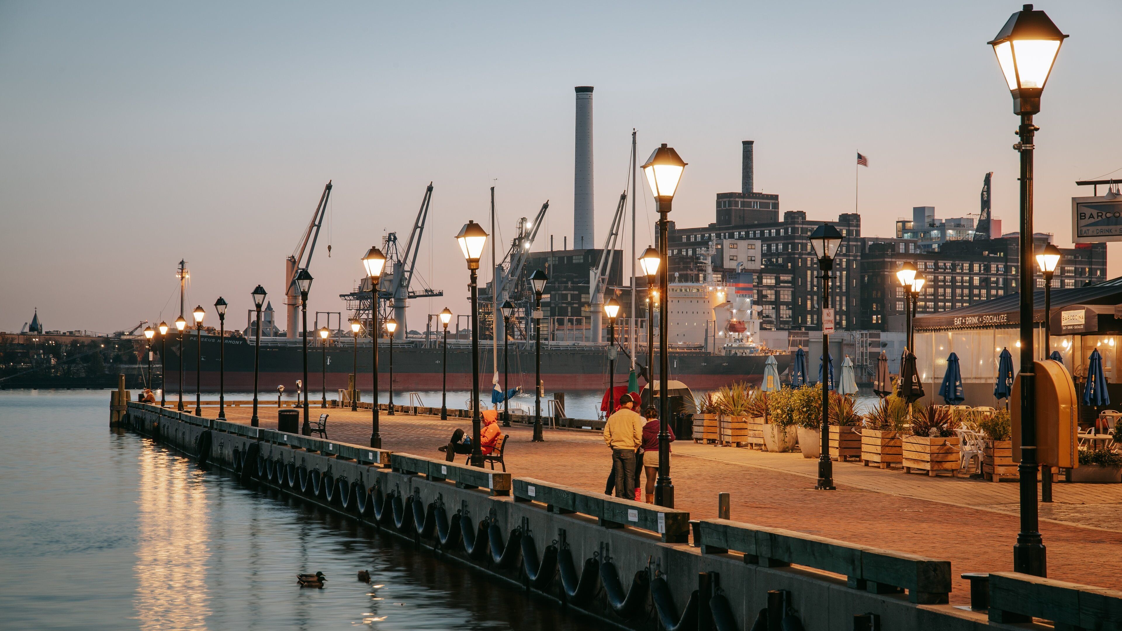 Fells Point showing a sunset, night scenes and a bay or harbor