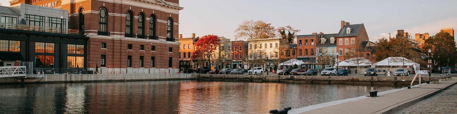 Fells Point which includes a sunset and a river or creek
