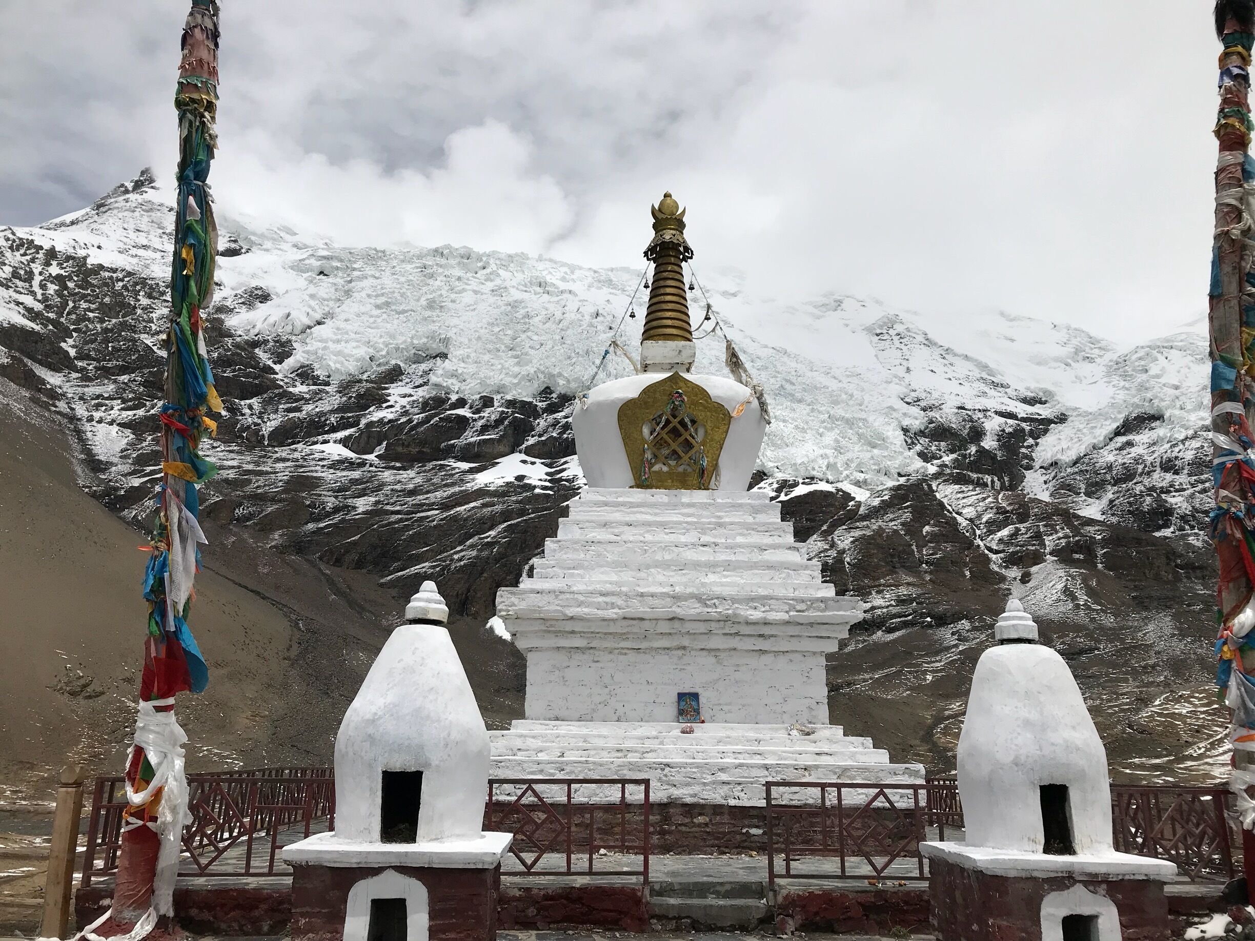 Elevation: 5560 meters (18,241 feet) About two hours away from Yamdrok Lake. It isn't a big glacier, but the white glacier is spectacular from the highway, and it is close enough (about 300 yards) to walk to from the highway.