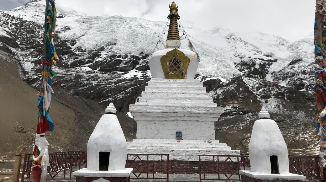 Elevation: 5560 meters (18,241 feet) About two hours away from Yamdrok Lake. It isn't a big glacier, but the white glacier is spectacular from the highway, and it is close enough (about 300 yards) to walk to from the highway.