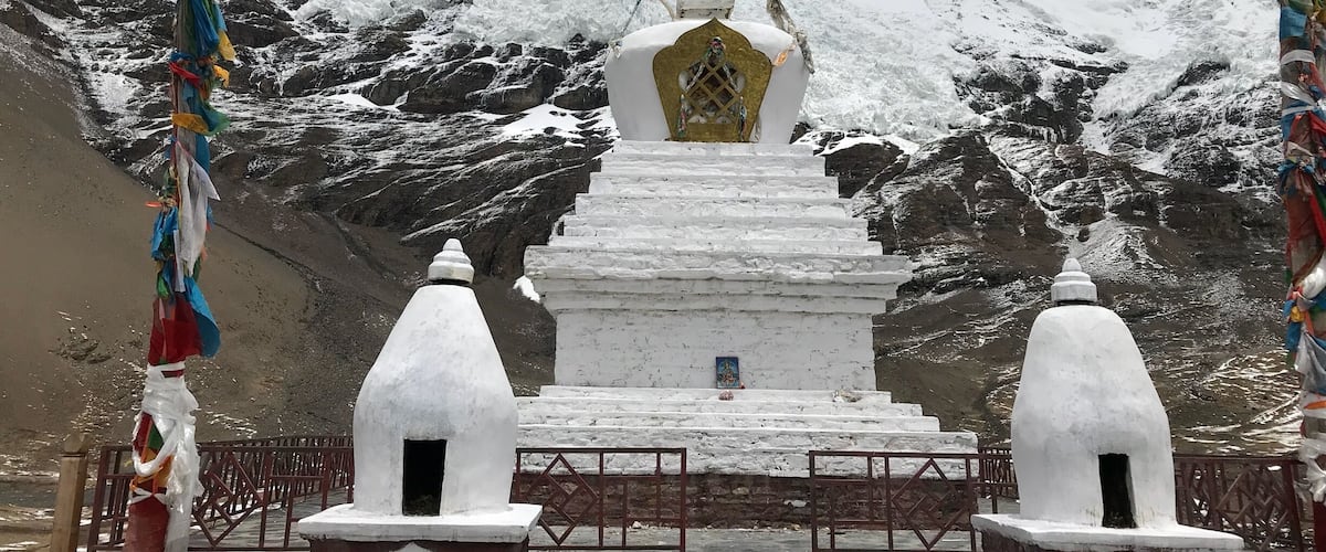 Elevation: 5560 meters (18,241 feet) About two hours away from Yamdrok Lake. It isn't a big glacier, but the white glacier is spectacular from the highway, and it is close enough (about 300 yards) to walk to from the highway.