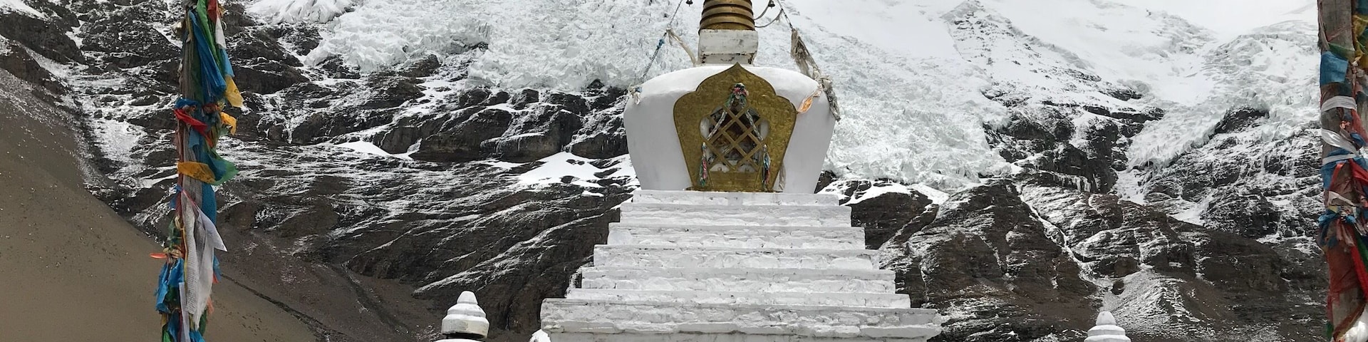 Elevation: 5560 meters (18,241 feet) About two hours away from Yamdrok Lake. It isn't a big glacier, but the white glacier is spectacular from the highway, and it is close enough (about 300 yards) to walk to from the highway.