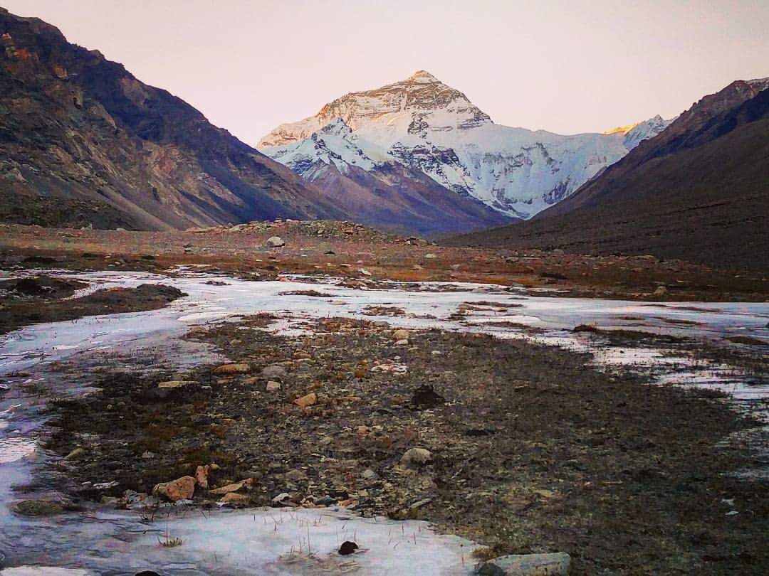 While you will have to hike for days to reach the base camp in Nepal, you can drive up to this point in China.