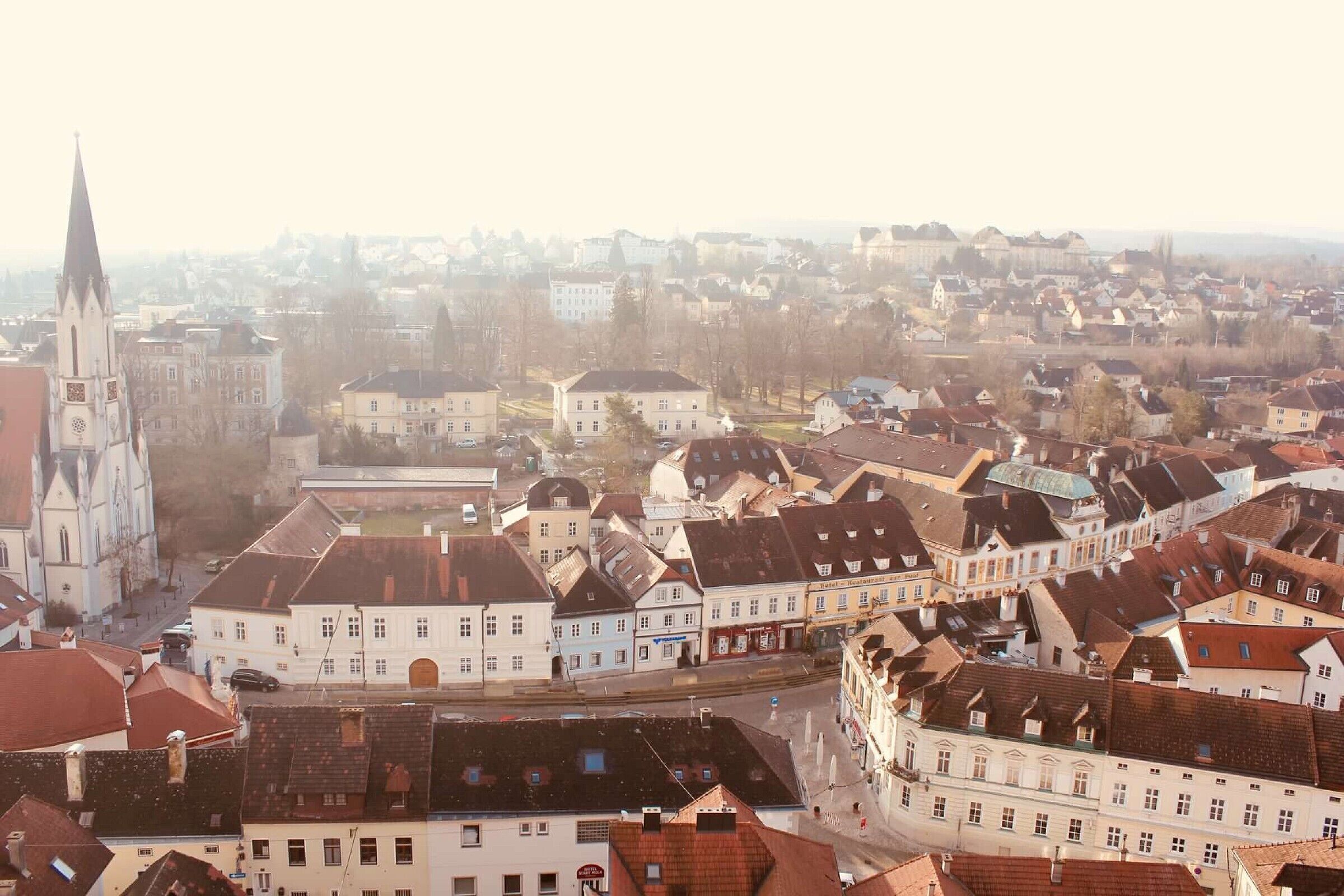 Melk has been an important spiritual and cultural center in Austria for over 1000 years. Stift Abbey became a Benedictine Monastery in 1089. Monks have lived and worked in the Abbey for over 900 years and it currently schools over 750 day students. The Abbey has been destroyed and rebuilt multiple times and today’s architecture is from the 18th century.   Shooting in to the haze and early morning sun.