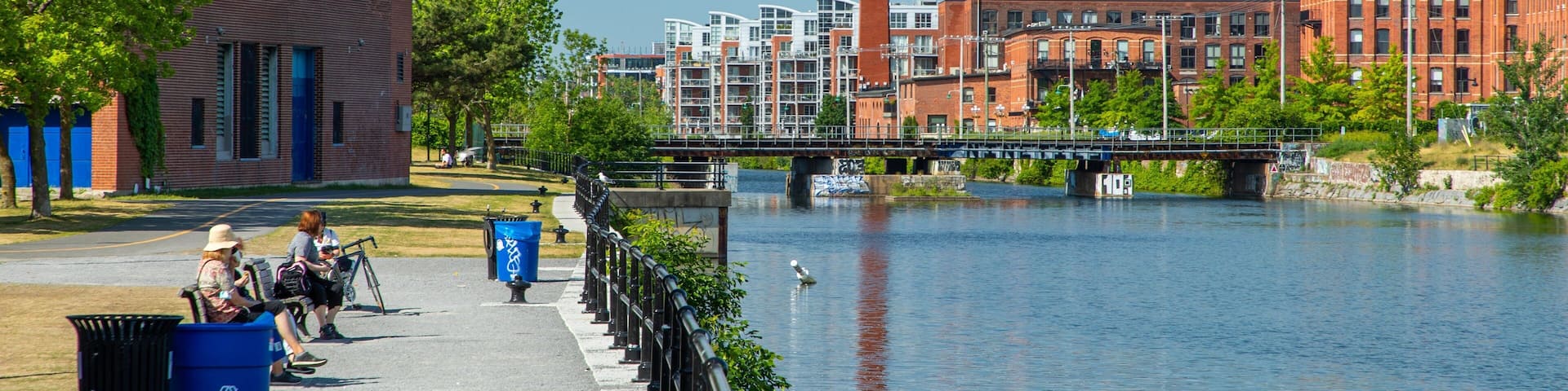 Lachine Canal National Historic Site showing a park and a river or creek