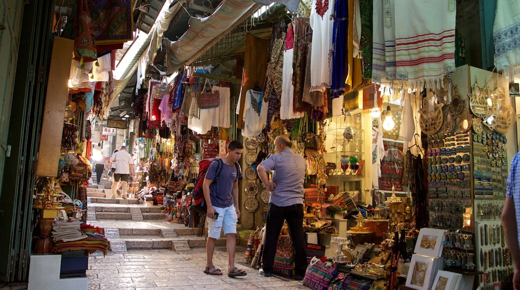 Mahane Yehuda Market which includes street scenes and markets as well as a small group of people