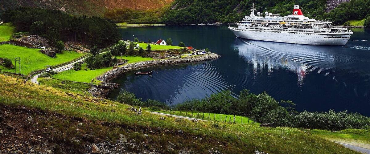 Norway has some of the most astonishing landscapes I've ever seen. I took this photo a few years back while on a road trip through this gorgeous (albeit expensive) country. #roadtrip #norway #fjord #goldenhour #waterlust