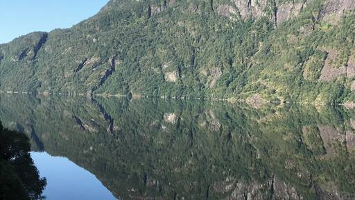 Driving to Voss from Bergen, the water was so still this morning, the reflection looks like a continuation of the mountain.
