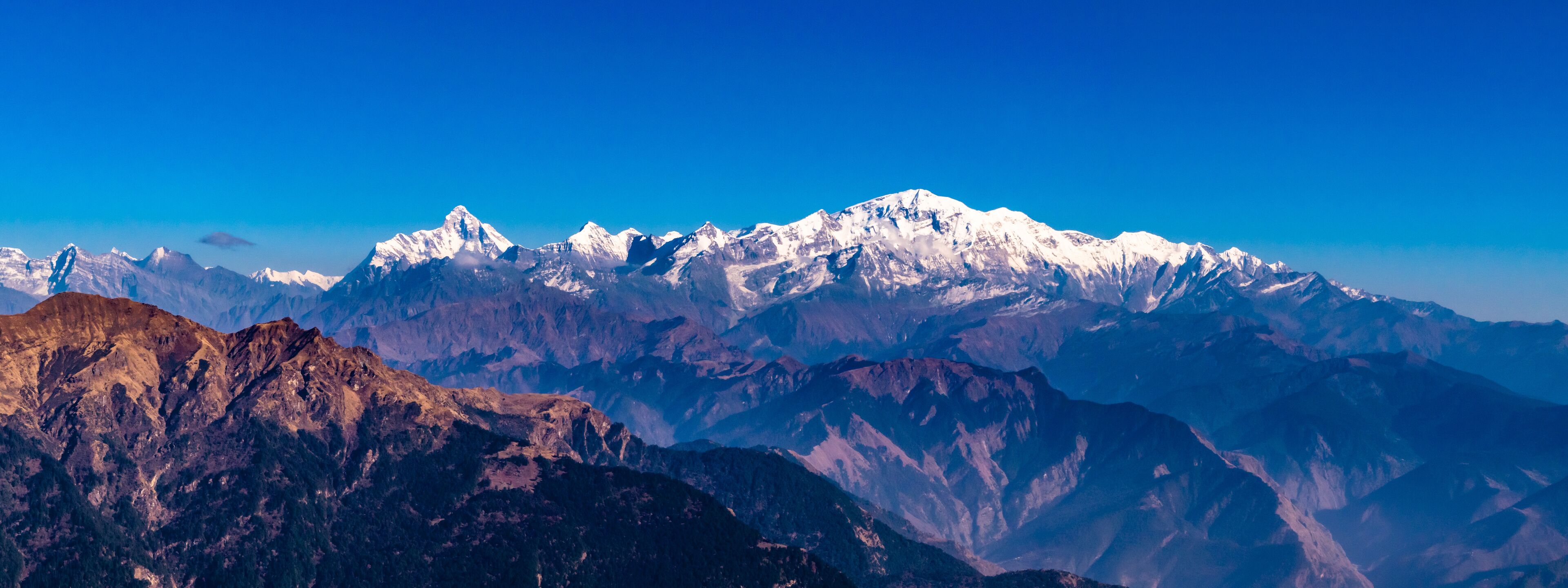 Panoramic view Himalayan mountains view from Chandrashila summit, Chopta. Chandrashila is a peak in the Himalayan ranges in Uttarakhand state of India. It lies at an altitude of 12,083 ft from the sea
