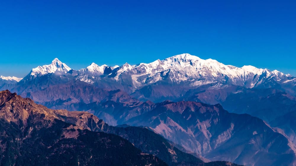 Panoramic view Himalayan mountains view from Chandrashila summit, Chopta. Chandrashila is a peak in the Himalayan ranges in Uttarakhand state of India. It lies at an altitude of 12,083 ft from the sea
