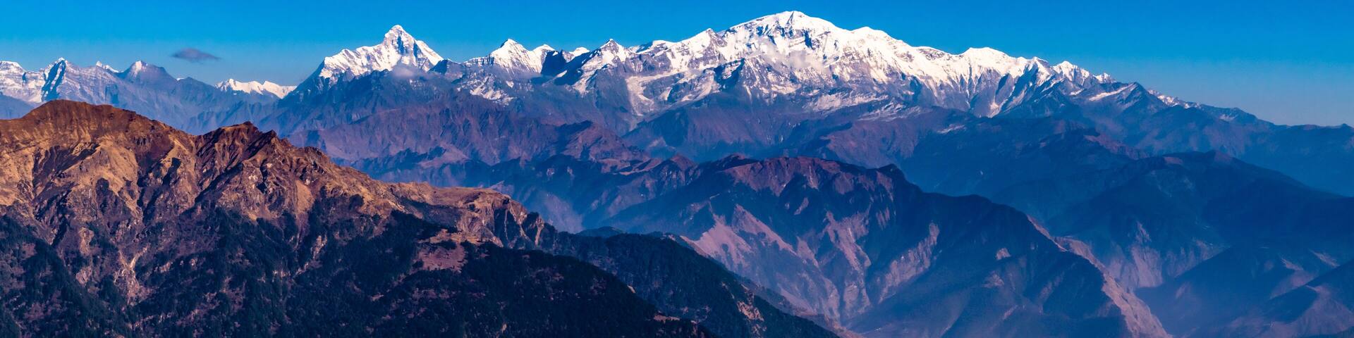 Panoramic view Himalayan mountains view from Chandrashila summit, Chopta. Chandrashila is a peak in the Himalayan ranges in Uttarakhand state of India. It lies at an altitude of 12,083 ft from the sea