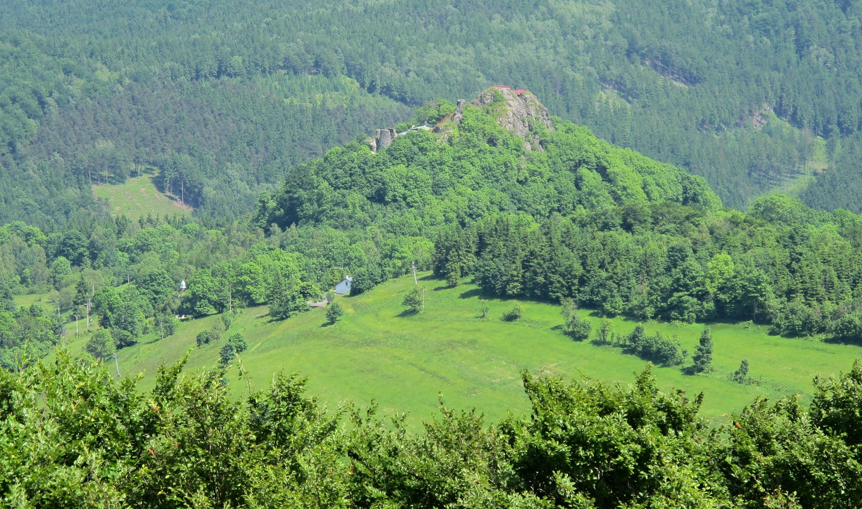 View from hill Jedlová towards the ruins of the Tolštejn Castle, landscape park Lužické hory in Děčín District