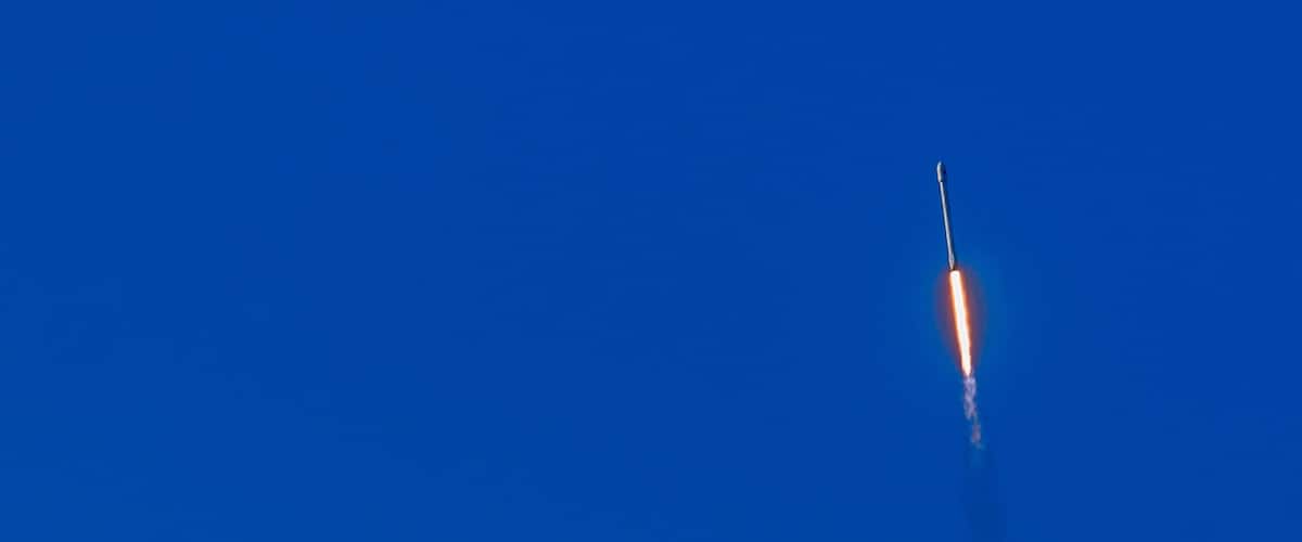 Lompoc, California, USA - January 14, 2017: Vandenberg Air Force Base where Spacex launched this morning a Falcon 9 rocket. The rocket in the blue air fifteen seconds after takeoff. Fire and smoke.