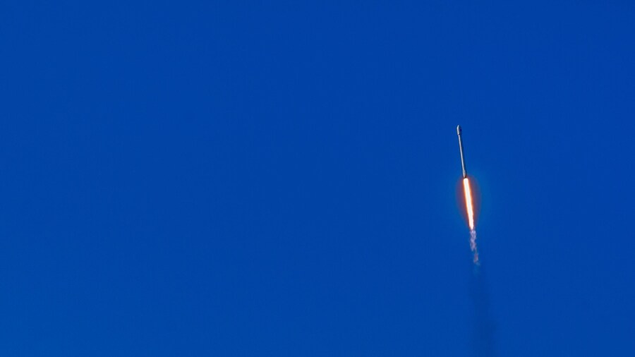 Lompoc, California, USA - January 14, 2017: Vandenberg Air Force Base where Spacex launched this morning a Falcon 9 rocket. The rocket in the blue air fifteen seconds after takeoff. Fire and smoke.