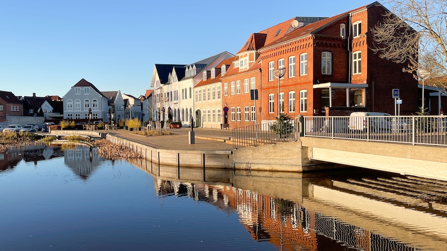 Slow travel Denmark: Old townhouses and the river Vidå at the entrance into the town of Tønder