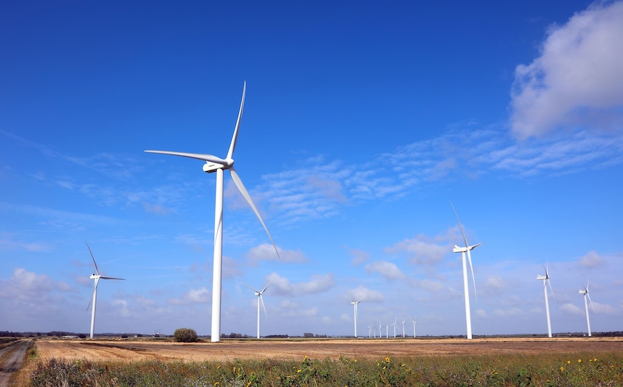 wind turbines are used to generate electricity using wind power on cultivated plains