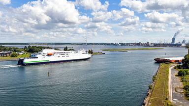 The modern ferry enters the port of Rostock. The ferry line connects the German port of Rostock with Gedser in Denmark.