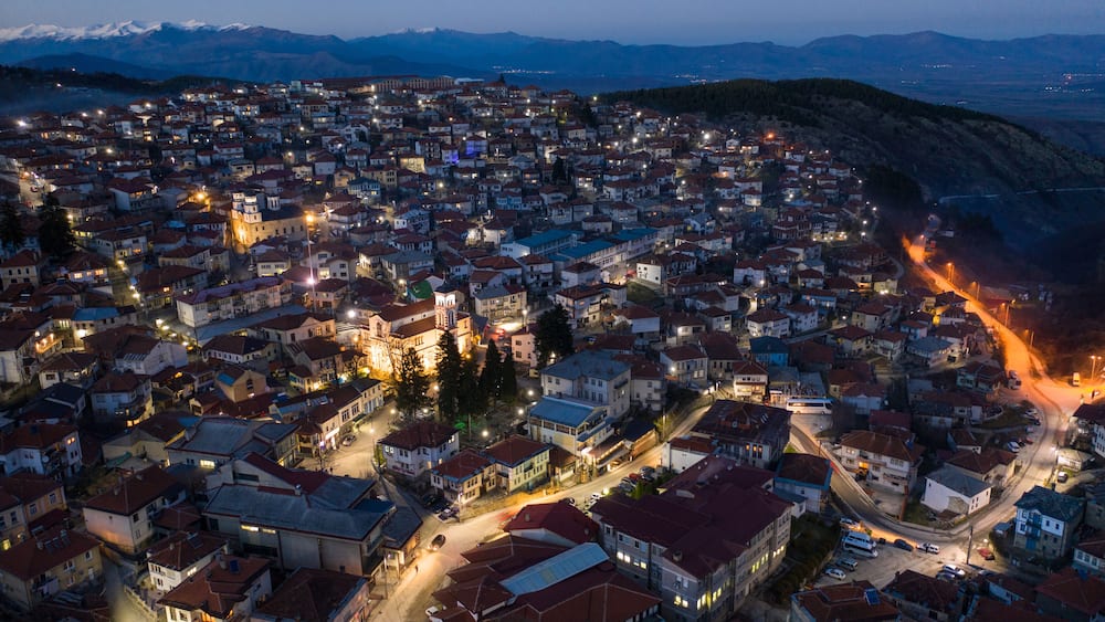 Aerial night view of a city of Krushevo in cental North Macedonia, Balkans