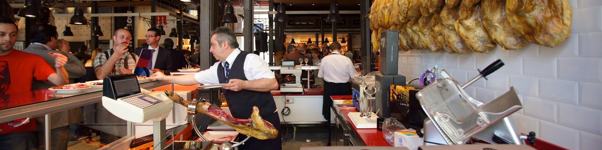 Mercado de San Miguel featuring interior views, markets and food