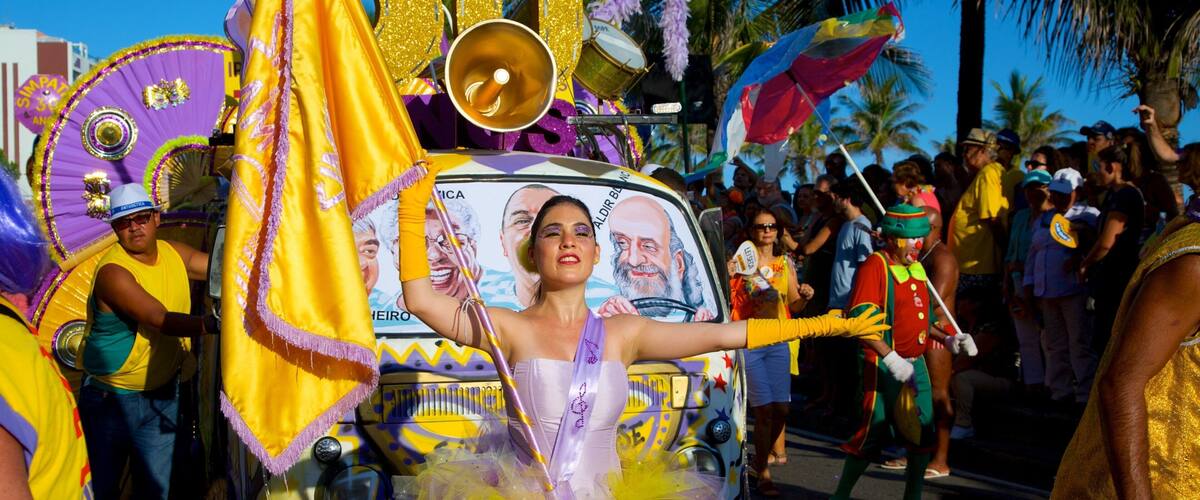 Hippie Fair showing street performance, a festival and signage