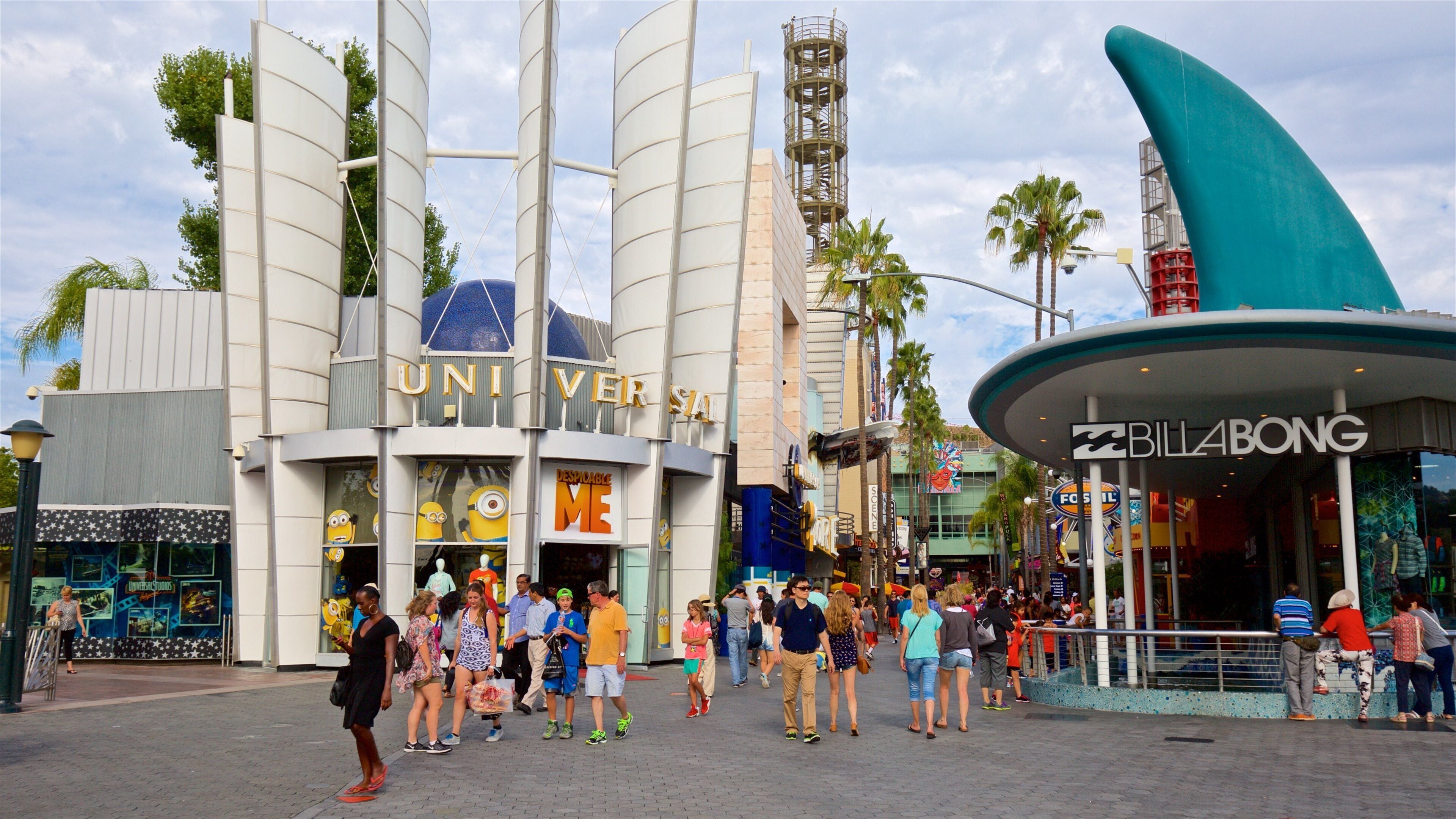 Universal CityWalk featuring rides and signage as well as a small group of people