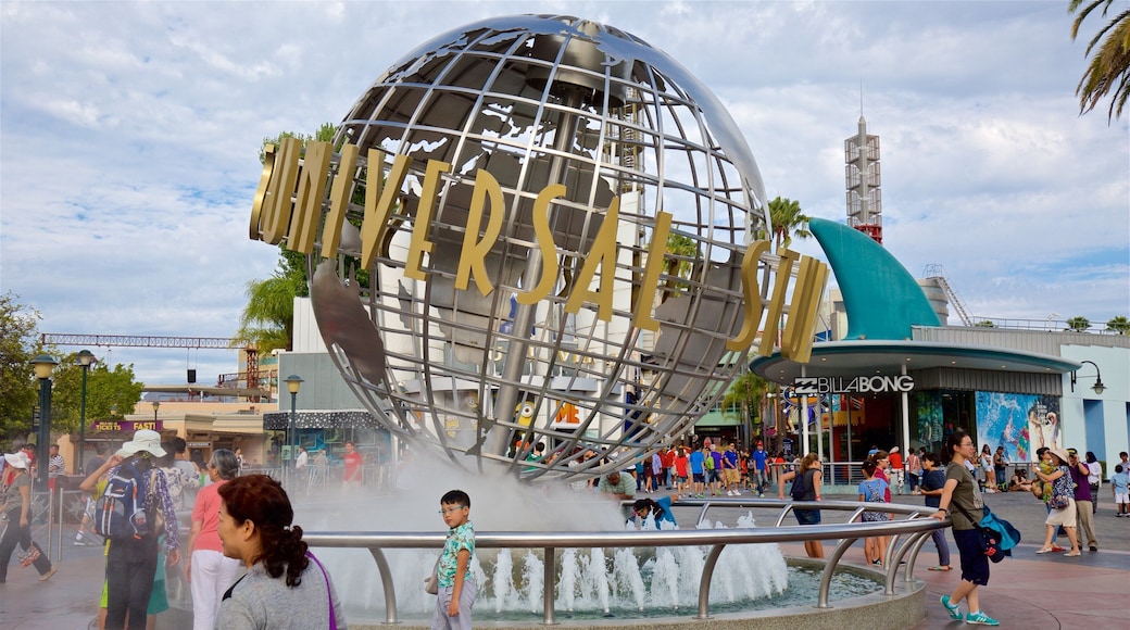 Universal CityWalk showing rides, signage and a fountain