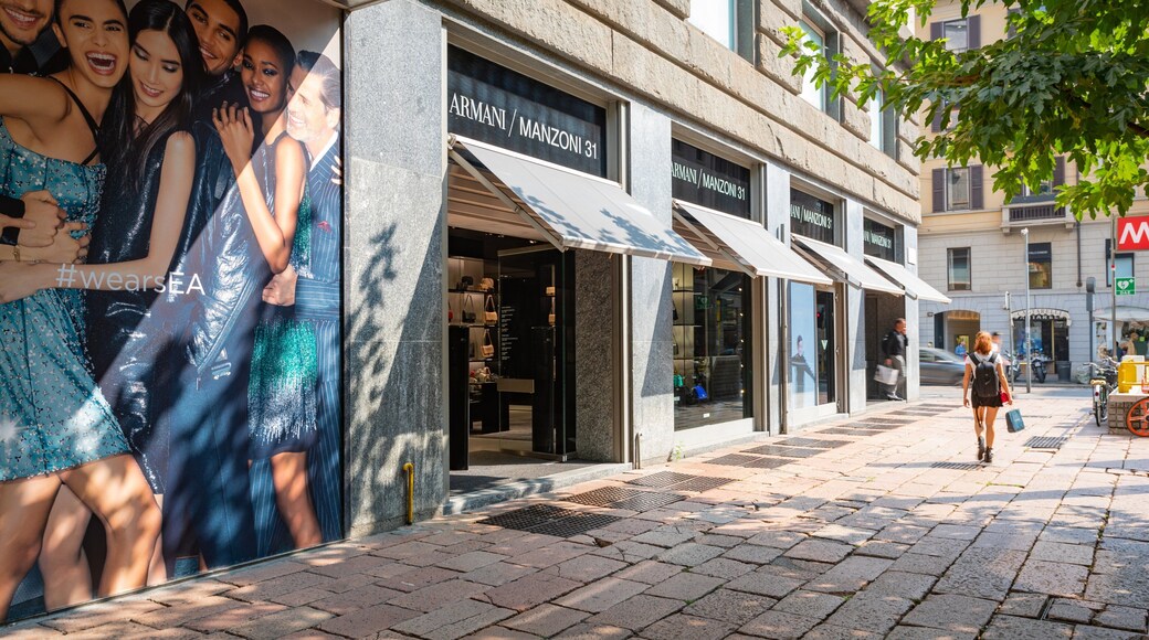 Armani Megastore showing signage and street scenes as well as an individual femail