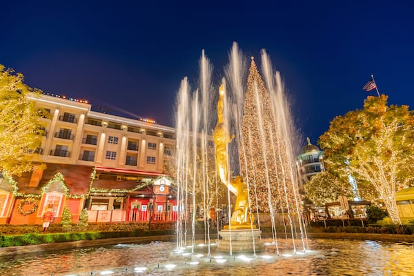 Night view of the fountain and the public art Spirit with christmas tree of American Youth in The Americana at Brand