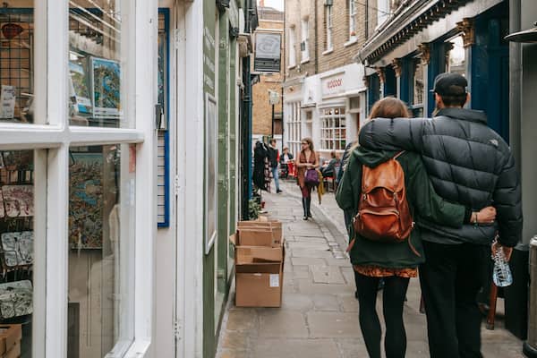 Greenwich Market featuring street scenes as well as a couple