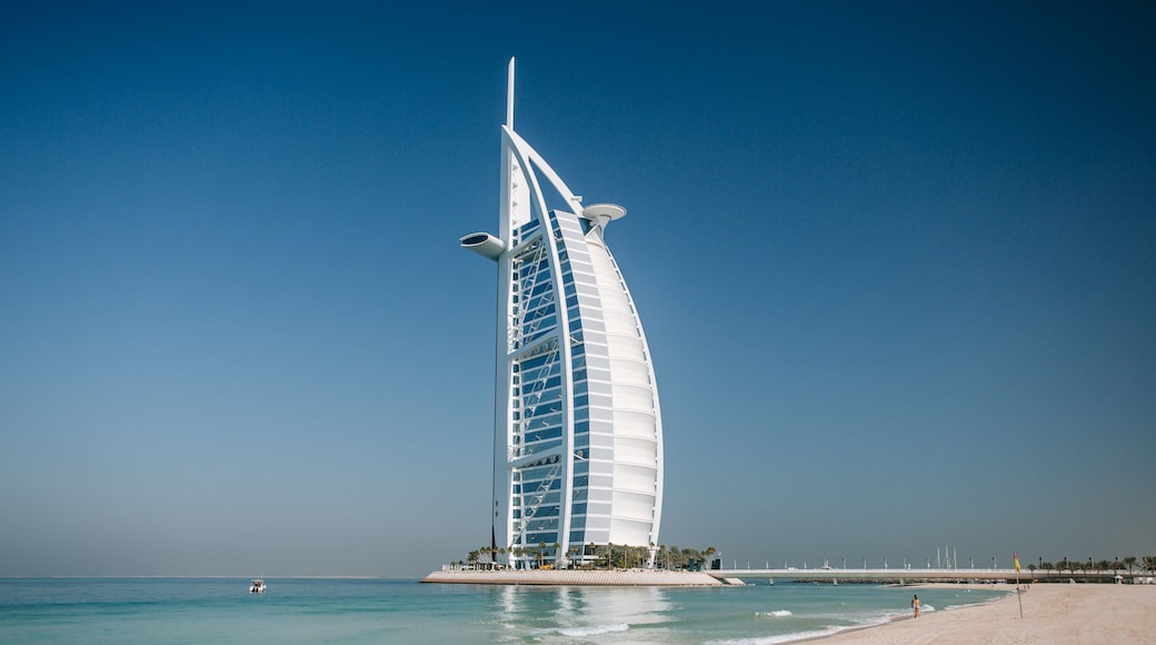 Souk Madinat Jumeirah which includes a skyscraper, general coastal views and modern architecture