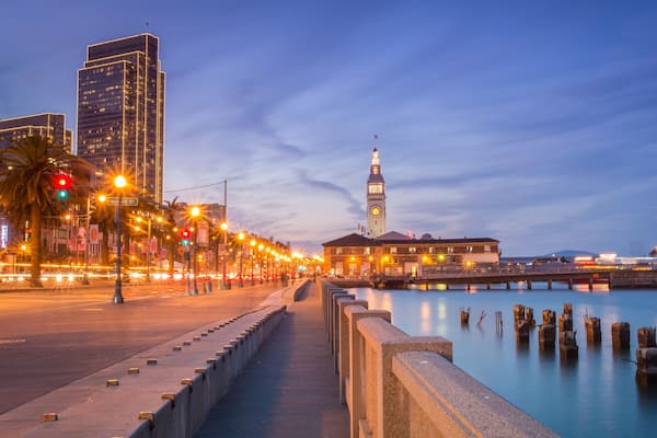 The Embarcadero at dusk showing the Ferry Building and the Embarcadero Center